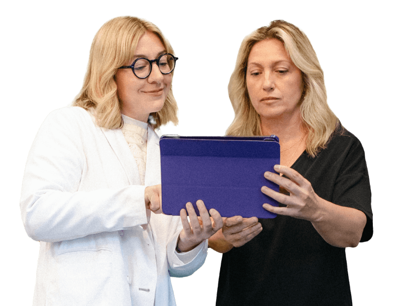 Two women working together